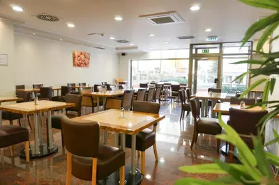 Ein Restaurant oder anderes Speiselokal in der Unterkunft Hotel Kaffeemühle