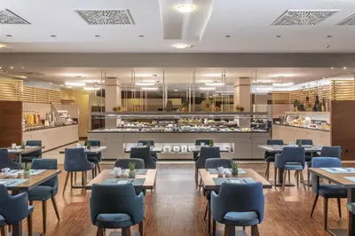 Ein Restaurant oder anderes Speiselokal in der Unterkunft NH Vienna Airport Conference Center