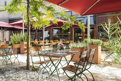 Ein Restaurant oder anderes Speiselokal in der Unterkunft NH Vienna Airport Conference Center