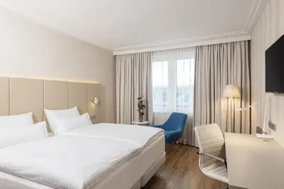 Ein Bett oder Betten in einem Zimmer der Unterkunft NH Vienna Airport Conference Center