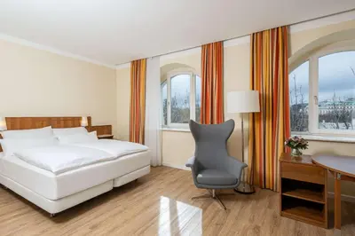 Ein Bett oder Betten in einem Zimmer der Unterkunft NH Wien Belvedere