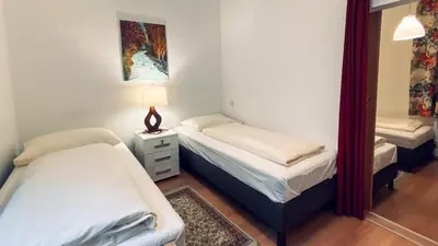 Ein Bett oder Betten in einem Zimmer der Unterkunft Pension Hotel Mariahilf