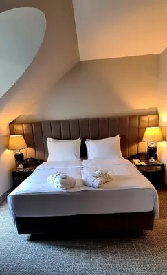 Ein Bett oder Betten in einem Zimmer der Unterkunft Eventhotel Pyramide