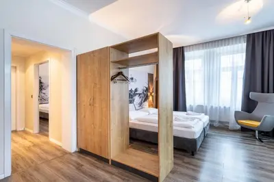 Ein Bett oder Betten in einem Zimmer der Unterkunft Hotel Westbahn