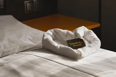 Ein Bett oder Betten in einem Zimmer der Unterkunft Hotel Westbahn