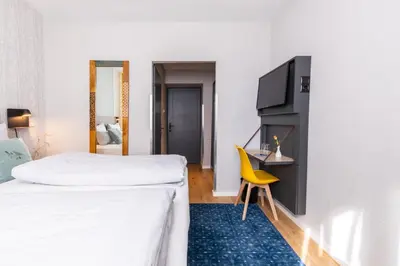 Ein Bett oder Betten in einem Zimmer der Unterkunft Garner Hotel Vienna by IHG