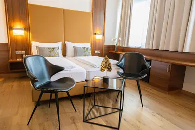 Ein Bett oder Betten in einem Zimmer der Unterkunft Das Reinisch Hotel - near Vienna Airport