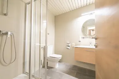 Ein Badezimmer in der Unterkunft Das Reinisch Just Rooms