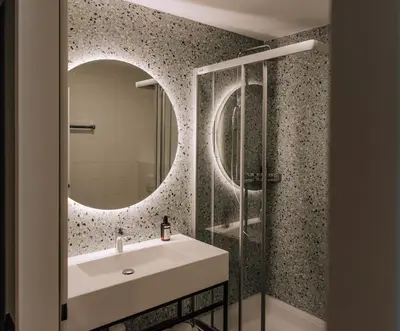 Ein Badezimmer in der Unterkunft HEINhotel vienna airport