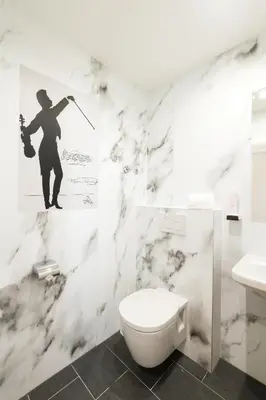 Ein Badezimmer in der Unterkunft Hotel Johann Strauss