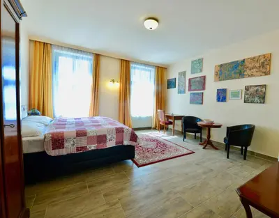 Ein Bett oder Betten in einem Zimmer der Unterkunft Altwienerhof Boutique Hotel