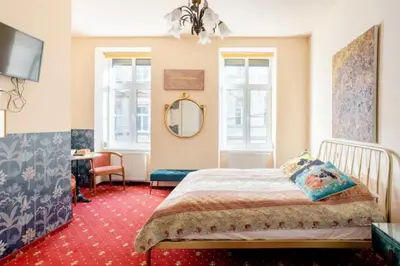 Ein Bett oder Betten in einem Zimmer der Unterkunft Altwienerhof Boutique Hotel