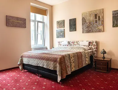 Ein Bett oder Betten in einem Zimmer der Unterkunft Altwienerhof Boutique Hotel