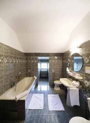 Ein Badezimmer in der Unterkunft Hotel Bergwirt Schönbrunn