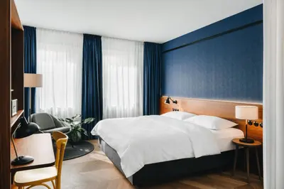 Ein Bett oder Betten in einem Zimmer der Unterkunft Hotel Gilbert