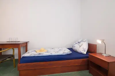 Ein Bett oder Betten in einem Zimmer der Unterkunft Pension San Francisco
