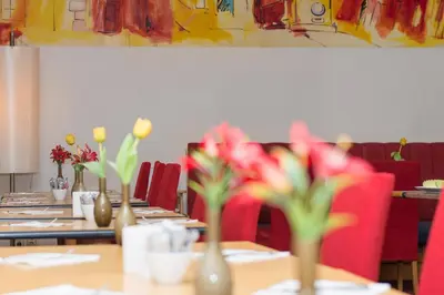 Ein Restaurant oder anderes Speiselokal in der Unterkunft Hotel Boltzmann