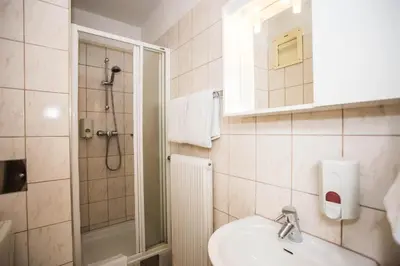 Ein Badezimmer in der Unterkunft Hotel Geblergasse