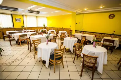 Ein Restaurant oder anderes Speiselokal in der Unterkunft Hotel Geblergasse
