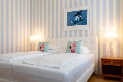 Ein Bett oder Betten in einem Zimmer der Unterkunft Hotel Schwalbe