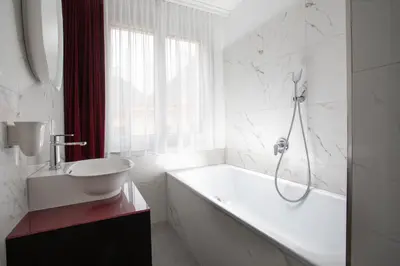 Ein Badezimmer in der Unterkunft ARTIST Boutique Hotel