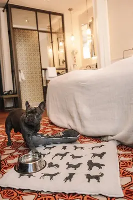 Ein Bett oder Betten in einem Zimmer der Unterkunft Hotel MOTTO