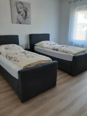 Ein Bett oder Betten in einem Zimmer der Unterkunft Eisenstadt Apartments