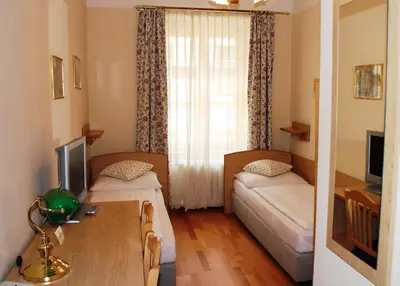 Ein Bett oder Betten in einem Zimmer der Unterkunft Hotel Graf Stadion