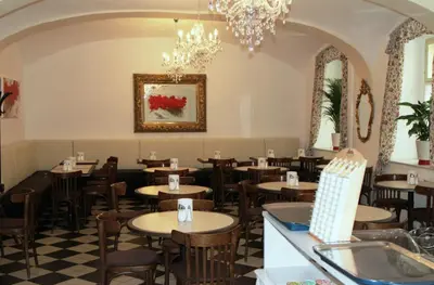 Ein Sitzbereich in der Unterkunft Hotel Graf Stadion