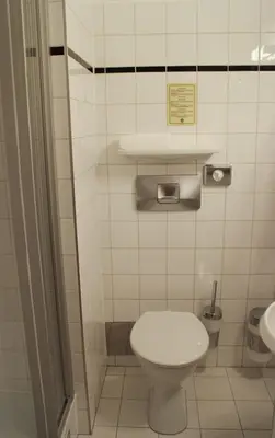 Ein Badezimmer in der Unterkunft Hotel Graf Stadion