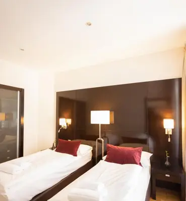 Ein Bett oder Betten in einem Zimmer der Unterkunft The Levante Rathaus Apartments