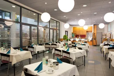 Ein Restaurant oder anderes Speiselokal in der Unterkunft Am Spiegeln dialog.hotel.wien