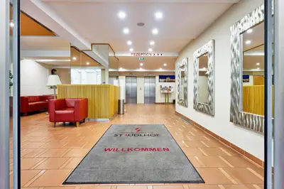 Ein Sitzbereich in der Unterkunft Hotel Strudlhof Vienna