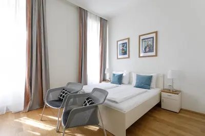 Ein Bett oder Betten in einem Zimmer der Unterkunft Riess City Rooms - Self Check-in