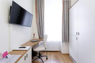 TV/Unterhaltungsangebot in der Unterkunft Riess City Rooms - Self Check-in