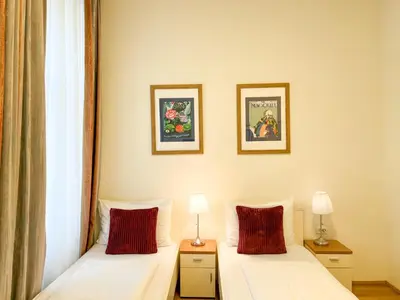 Ein Bett oder Betten in einem Zimmer der Unterkunft Riess City Rooms - Self Check-in