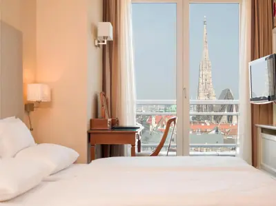 Ein Bett oder Betten in einem Zimmer der Unterkunft Hotel Am Parkring