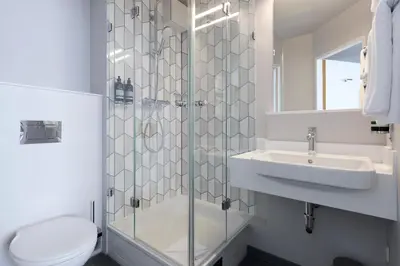 Ein Badezimmer in der Unterkunft Premier Inn Wien City Hauptbahnhof