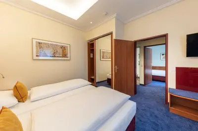 Ein Bett oder Betten in einem Zimmer der Unterkunft Austria Classic Hotel Wien