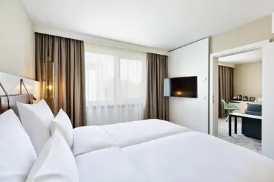 Ein Bett oder Betten in einem Zimmer der Unterkunft Austria Trend Hotel Bosei Wien