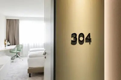 Ein Bett oder Betten in einem Zimmer der Unterkunft Austria Trend Hotel Bosei Wien