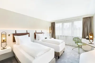 Ein Bett oder Betten in einem Zimmer der Unterkunft Austria Trend Hotel Bosei Wien