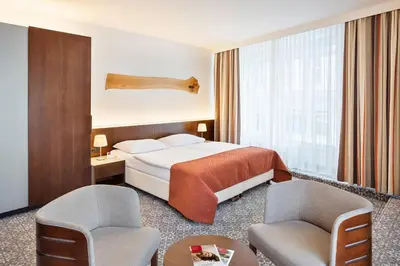 Ein Bett oder Betten in einem Zimmer der Unterkunft Austria Trend Hotel Europa Wien