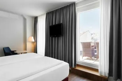 Ein Bett oder Betten in einem Zimmer der Unterkunft Four Points Flex by Sheraton Vienna Hauptbahnhof