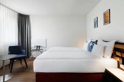 Ein Bett oder Betten in einem Zimmer der Unterkunft Four Points Flex by Sheraton Vienna Hauptbahnhof