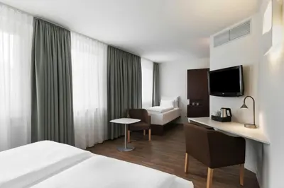 Ein Bett oder Betten in einem Zimmer der Unterkunft Four Points Flex by Sheraton Vienna Hauptbahnhof