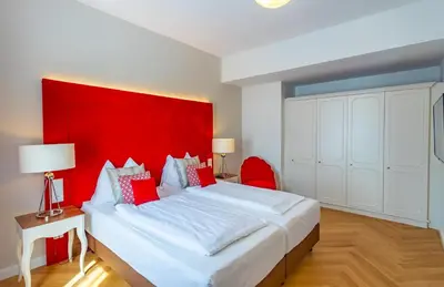 Ein Bett oder Betten in einem Zimmer der Unterkunft Theaterhotel & Suites Wien