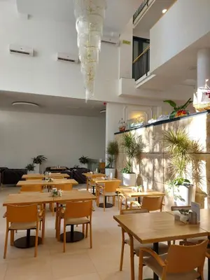 Ein Sitzbereich in der Unterkunft Gartenhotel Altmannsdorf