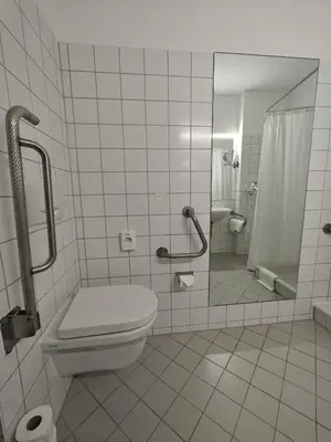 Ein Badezimmer in der Unterkunft Gartenhotel Altmannsdorf