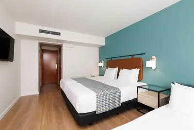 Ein Bett oder Betten in einem Zimmer der Unterkunft Exe Vienna
